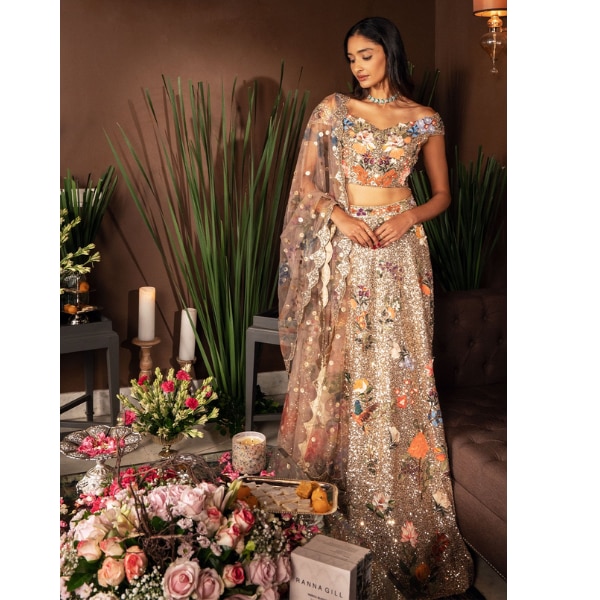 https://akm-img-a-in.tosshub.com/lingo/brt/images/photo_gallery/202606/ranna_gill_gilded_flora_lehenga_set_rs120000.png
