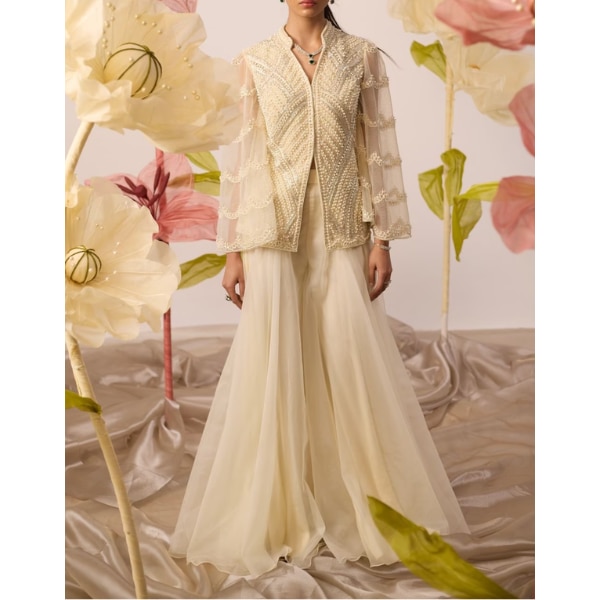 https://akm-img-a-in.tosshub.com/lingo/brt/images/photo_gallery/202606/roqa_ivory_organza_embroidered_jacket_sharara_set_rs72000.png
