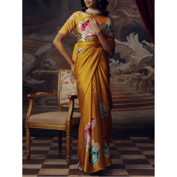 https://akm-img-a-in.tosshub.com/lingo/brt/images/photo_gallery/202606/studio_113_orange_pure_satin_silk_floral_hand_painted_saree_rs16585.png
