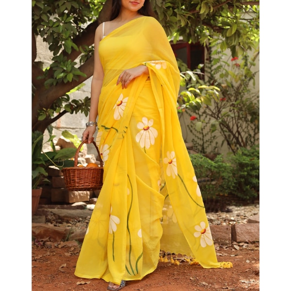 https://akm-img-a-in.tosshub.com/lingo/brt/images/photo_gallery/202606/teejh_blossom_breeze_yellow_printed_mulmul_cotton_saree_rs8999.png