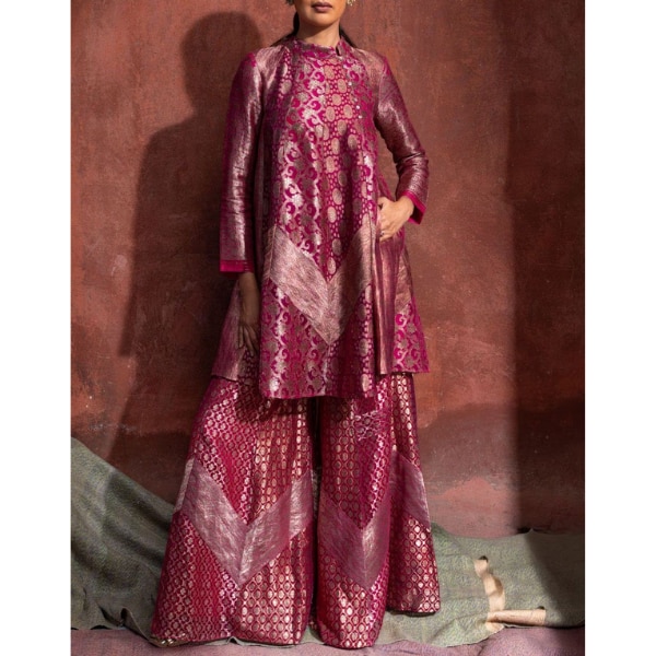 https://akm-img-a-in.tosshub.com/lingo/brt/images/photo_gallery/202606/urvashi_kaur_pink_organza_brocade_sharara_set_rs63600.png