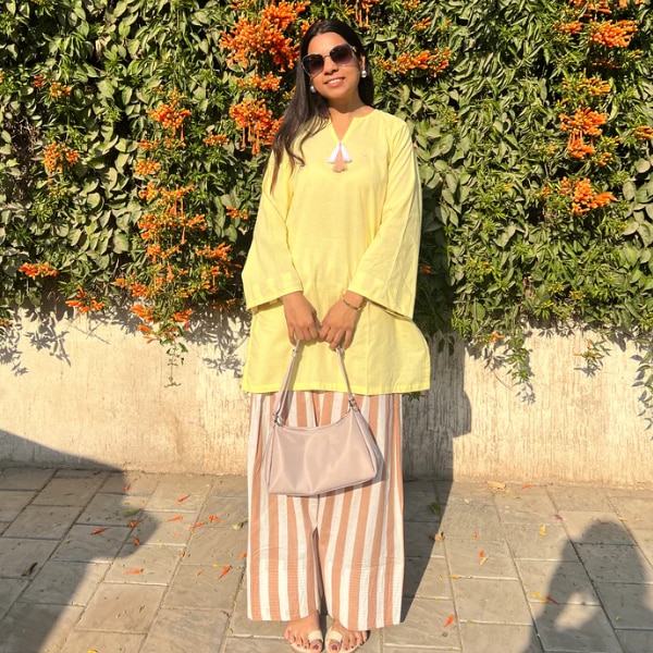 https://akm-img-a-in.tosshub.com/lingo/brt/images/photo_gallery/202607/baaori_yellow_kurta_with_contrast_farshi_salwar_set_rs2604.png
