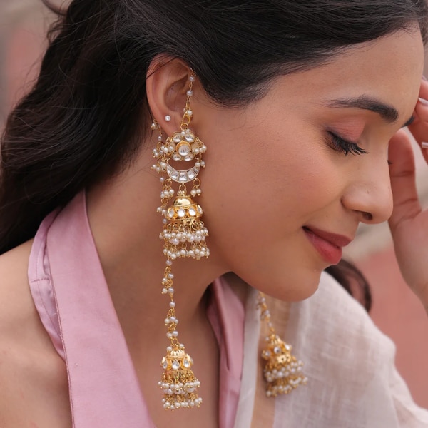 https://akm-img-a-in.tosshub.com/lingo/brt/images/photo_gallery/202607/binni_anvitha_celestia_pachi_kundan_radiance_chain_earrings_rs6999.png
