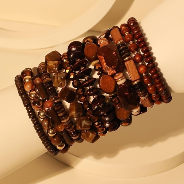 https://akm-img-a-in.tosshub.com/lingo/brt/images/photo_gallery/202607/bling_queen_boho_wood_bead_bracelet_set_rs1999.png