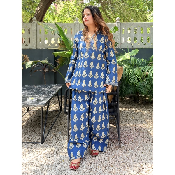 https://akm-img-a-in.tosshub.com/lingo/brt/images/photo_gallery/202607/dimple_design_studio_blue_printed_farshi_salwar_set_rs3499.png