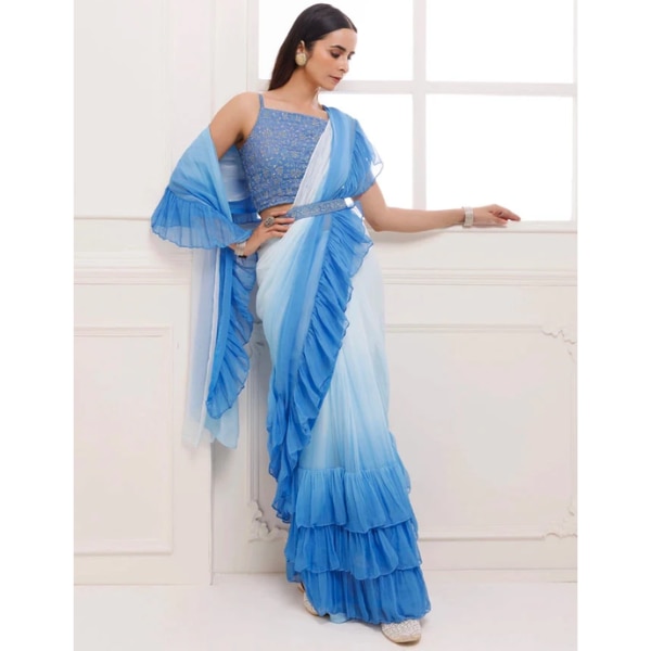 https://akm-img-a-in.tosshub.com/lingo/brt/images/photo_gallery/202607/geroo_jaipur_blue_ombre_ruffled_chiffon_saree_rs6999.png