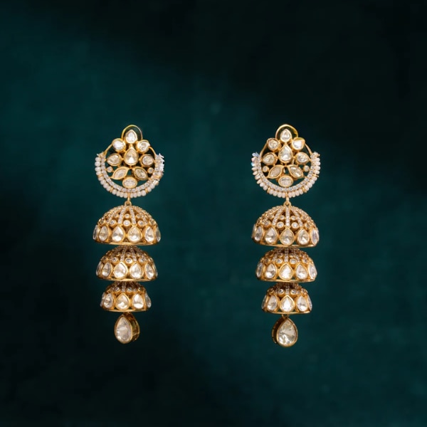 https://akm-img-a-in.tosshub.com/lingo/brt/images/photo_gallery/202607/joolry_royal_jhumka_earrings_rs9600.png