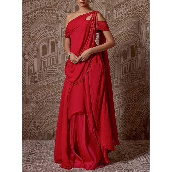 https://akm-img-a-in.tosshub.com/lingo/brt/images/photo_gallery/202607/ridhi_mehra_red_tissue_embroidered_draped_corset_saree_set_rs79800.png