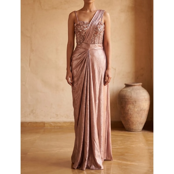 https://akm-img-a-in.tosshub.com/lingo/brt/images/photo_gallery/202607/samyakk_pink_crepe_ready_to_wear_saree_with_embroidered_corset_style_blouse_rs18990.png