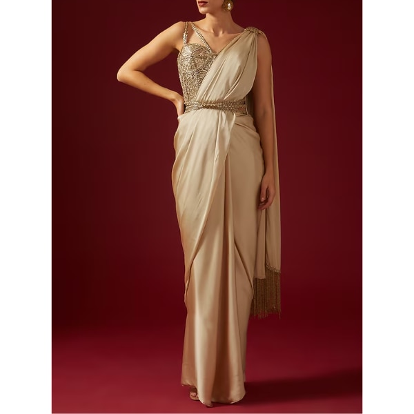 https://akm-img-a-in.tosshub.com/lingo/brt/images/photo_gallery/202607/shantnu_nikhil_gold_satin_embroidered_corset_saree_set_rs155000.png