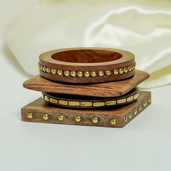 https://akm-img-a-in.tosshub.com/lingo/brt/images/photo_gallery/202607/the_loom_brown_handcrafted_wooden_bangle_rs2000.png