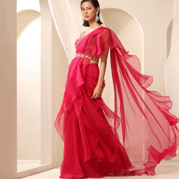 https://akm-img-a-in.tosshub.com/lingo/brt/images/photo_gallery/202607/weaverstory_magenta_organza_pre-stitched_ruffled_saree_rs32995.png