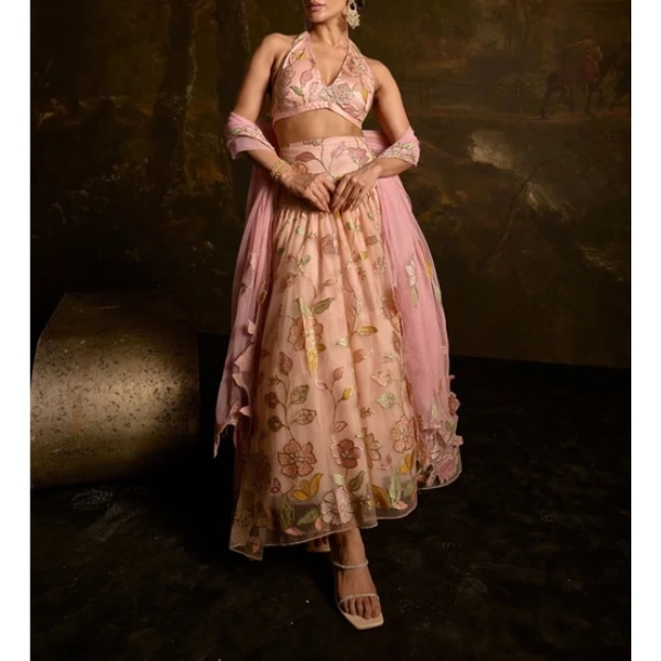 https://akm-img-a-in.tosshub.com/lingo/brt/images/photo_gallery/202608/adishri_peach_halter-neck_embroidered_lehenga_rs37390.png