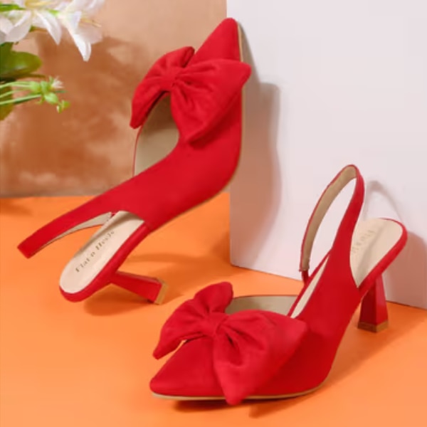 https://akm-img-a-in.tosshub.com/lingo/brt/images/photo_gallery/202608/flat_n_heels_women_red_sandal_heels_rs3999.png