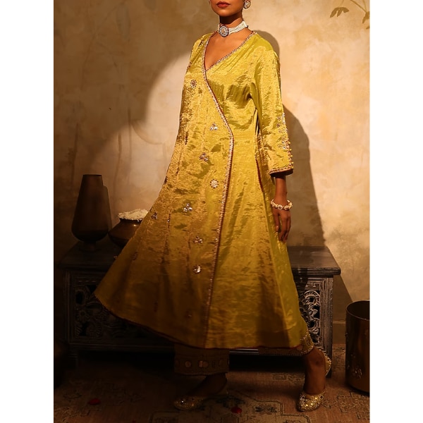 https://akm-img-a-in.tosshub.com/lingo/brt/images/photo_gallery/202608/house_of_aas_pista_green_tissue_sequin_embroidered_angrakha_kurta_set_rs32900.png