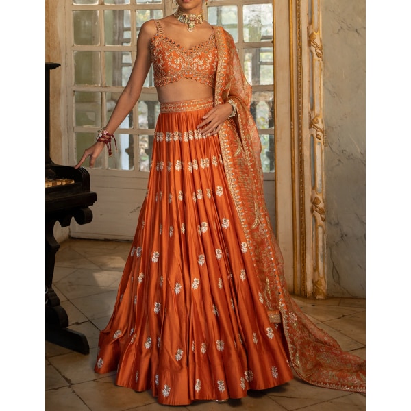 https://akm-img-a-in.tosshub.com/lingo/brt/images/photo_gallery/202608/paulmi_and_harsh_nimrit_lehenga_set_rs92400.png