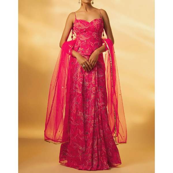 https://akm-img-a-in.tosshub.com/lingo/brt/images/photo_gallery/202608/vana_ethnics_pink_paisley_corset_lehenga_set_rs31999.png
