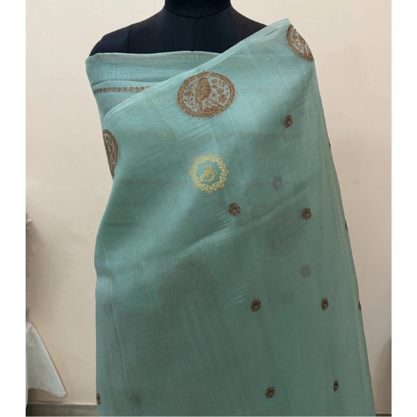 https://akm-img-a-in.tosshub.com/lingo/brt/images/photo_gallery/202609/aura_benaras_sage_green_pure_kora_silk_handloom_banarasi_saree_rs10925.png