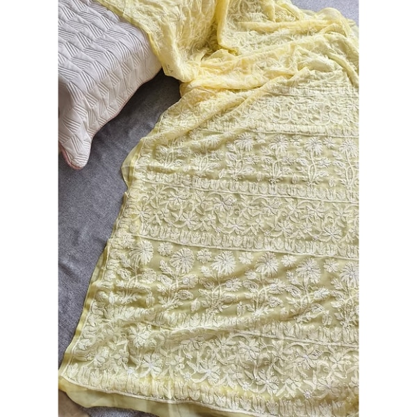 https://akm-img-a-in.tosshub.com/lingo/brt/images/photo_gallery/202609/dhup_chaanv_georgette_chikankari_saree-_light_yellow_rs8000.png