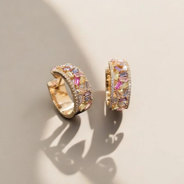 https://akm-img-a-in.tosshub.com/lingo/brt/images/photo_gallery/202609/joolry_geometric_rainbow_hoops_rs5500.png