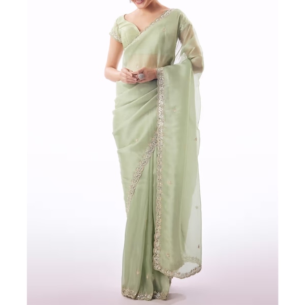 https://akm-img-a-in.tosshub.com/lingo/brt/images/photo_gallery/202609/kalki_sage_green_tissue_saree_with_scallop_border_and_cutdana_sequin_mirror_embroidery_rs11995.png