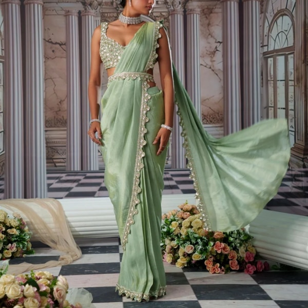 https://akm-img-a-in.tosshub.com/lingo/brt/images/photo_gallery/202609/nidhika_shekhar_divine_zari_saree_set_rs41400.png
