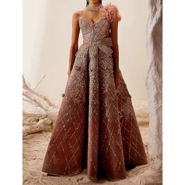 https://akm-img-a-in.tosshub.com/lingo/brt/images/photo_gallery/202610/adaara_couture_rose_gold_hand_embroidered_gown_rs225000.png