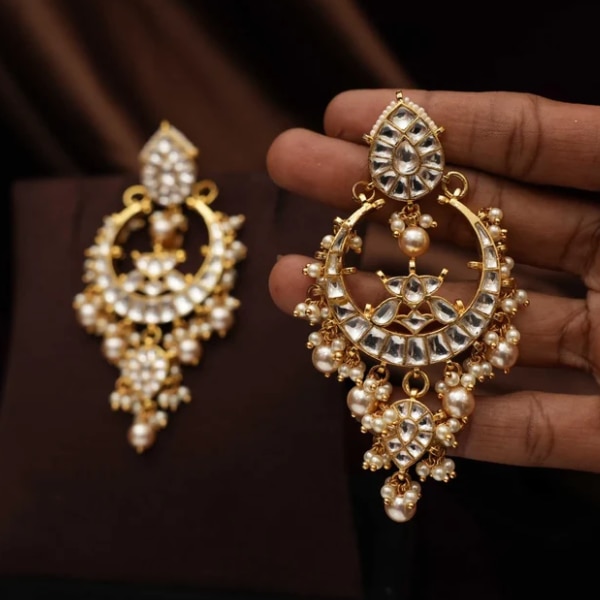 https://akm-img-a-in.tosshub.com/lingo/brt/images/photo_gallery/202610/rimli_sharvi_polki_chandbali_earrings_rs6850.png