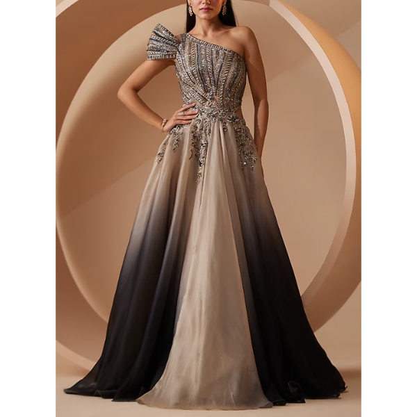 https://akm-img-a-in.tosshub.com/lingo/brt/images/photo_gallery/202610/roqa_grey_ombre_organza_sequins_embellished_gown_rs52000.png