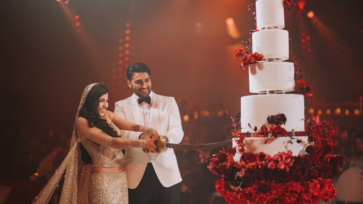 This wedding reception featured a cake that dropped from the ceiling