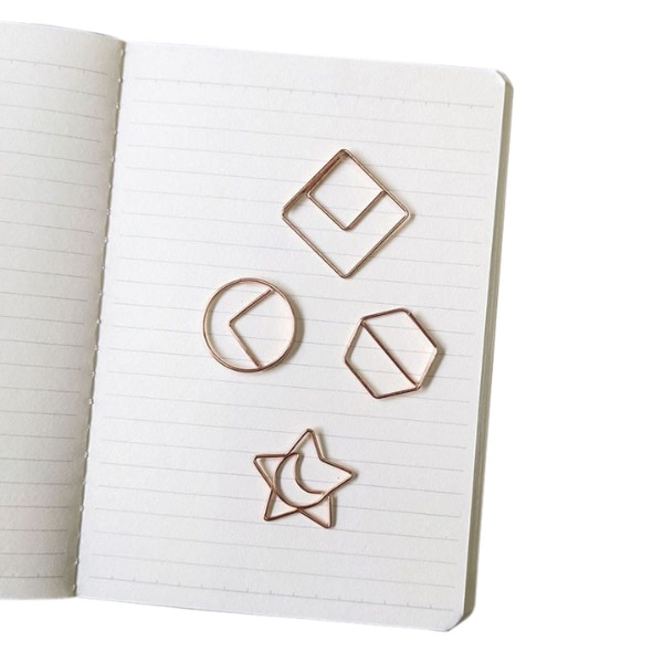 The Black Canvas Rose Gold Geometric Paper Clips Set of 4, ₹250