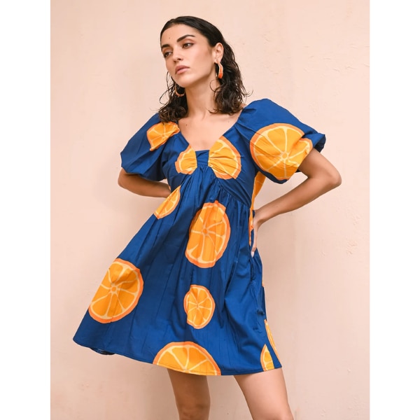 The Burnt Soul Tangerine Bow Dress, ₹4,150 approx.