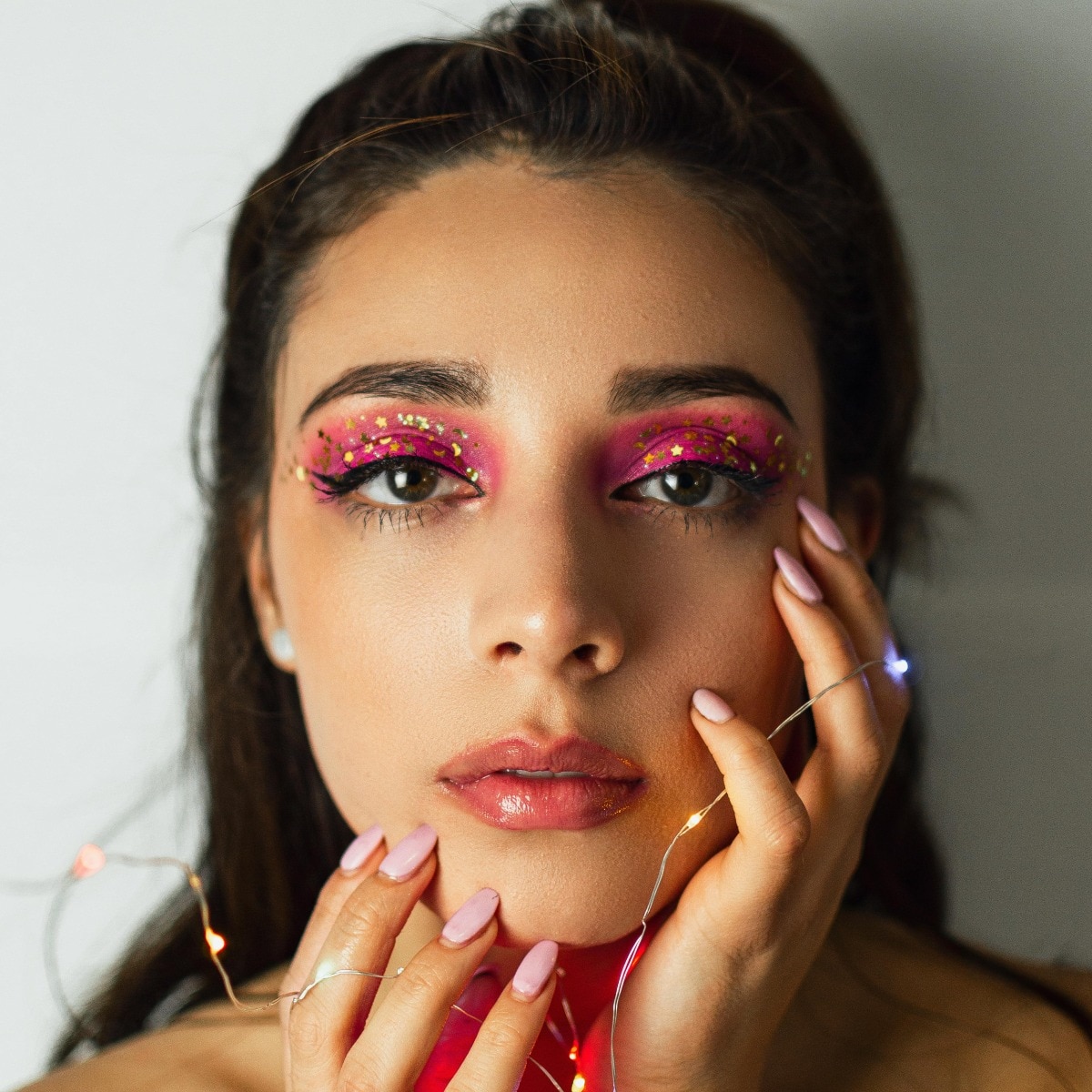 The best coral pink lip glosses to keep in your handbag at all times