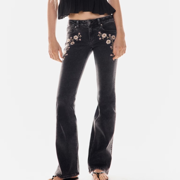 H&M Flared Low Jeans, ₹2,599