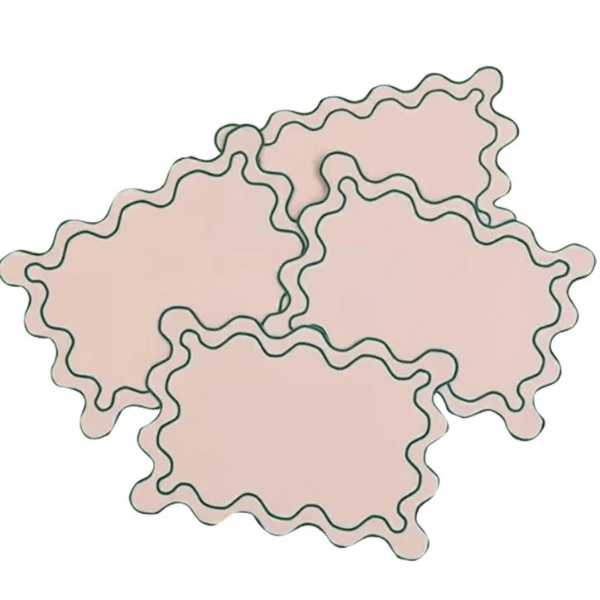 Lovedwell Blush Scalloped Placemats, ₹3,500 (for set of 4)