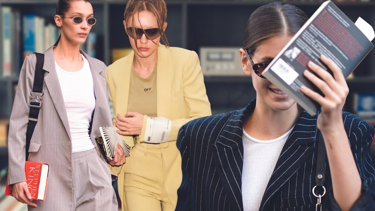 The fashion set wants you to notice what they’re reading