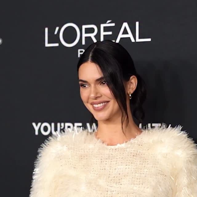 Kendall Jenner just delivered peak goddess glam a feathery white gown at the L’Oréal Women of Worth carpet