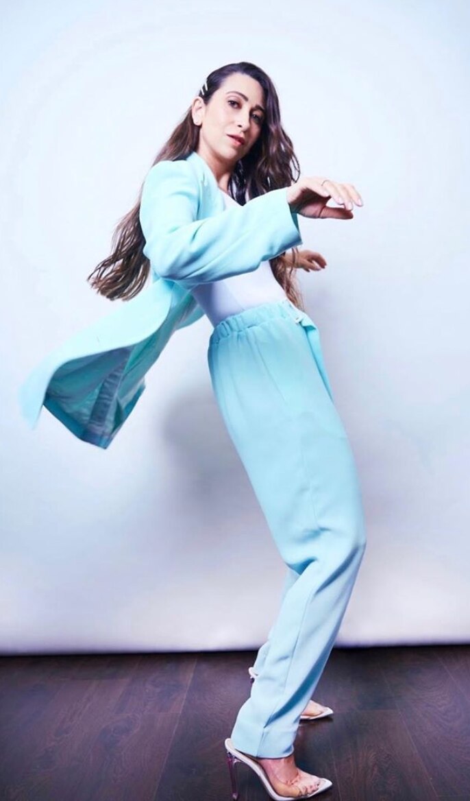 Karisma Kapoor in a powder blue suit by Edeline Lee.