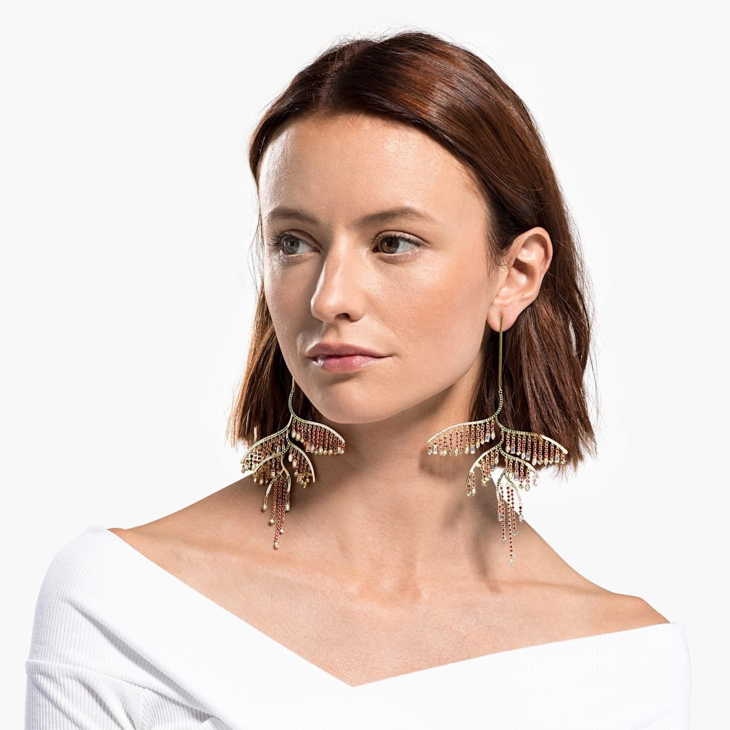 18) Swarovski, Tropical Leaf Pierced Earrings, ₹16,900