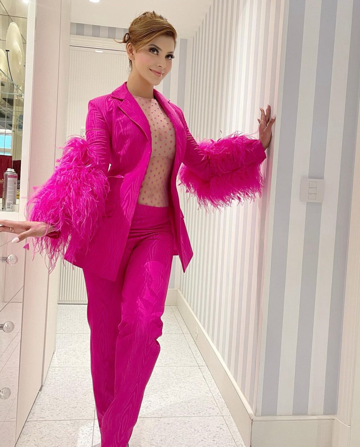 Urvashi Rautula ina pantsuit with feathered details by Ali Younes