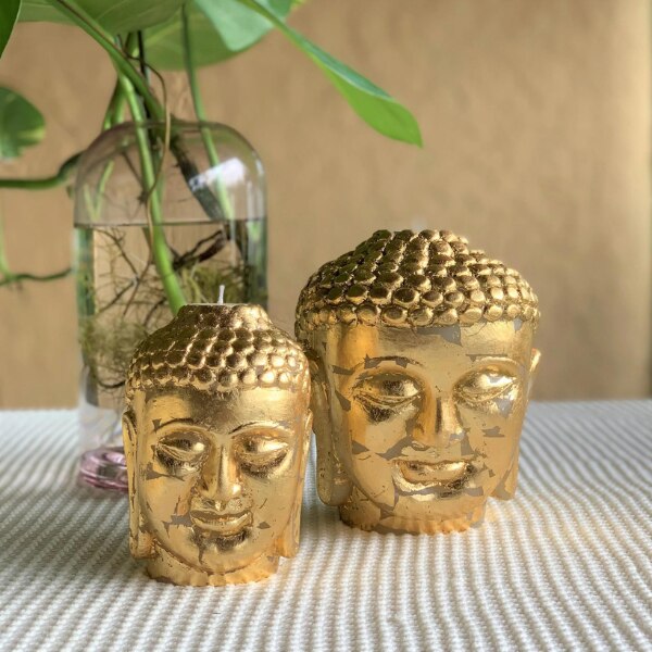Sculpted Gold Leaf Buddha Candle with a replaceable tealight by Faraway Tree,