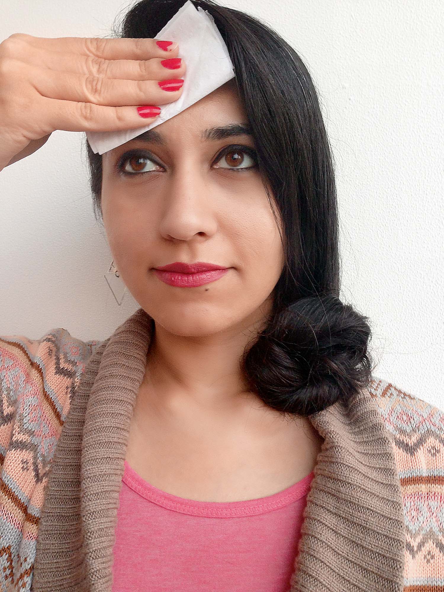 Blot your face with a clean toilet seat cover