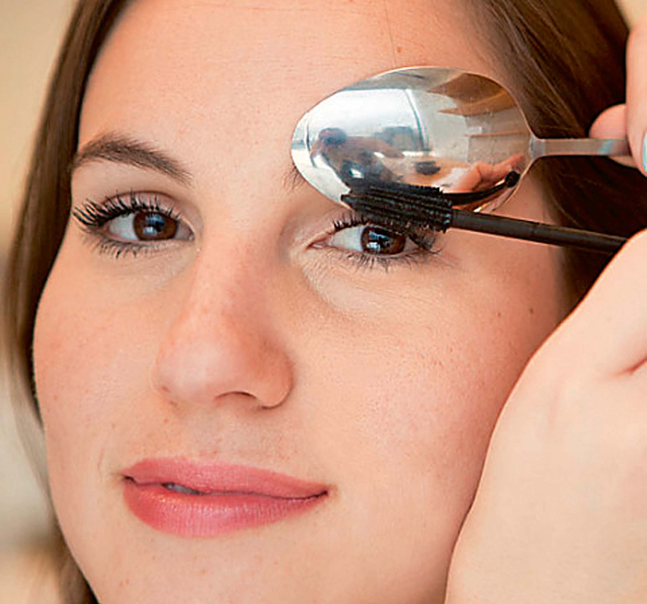 Use a spoon to avoid mascara marks on the upper eye lid