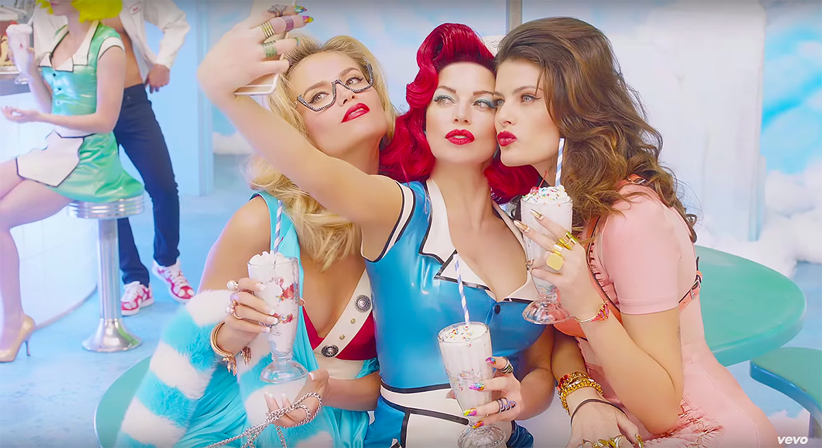 Natasha Poly (L) and Isabeli Fontana (R)