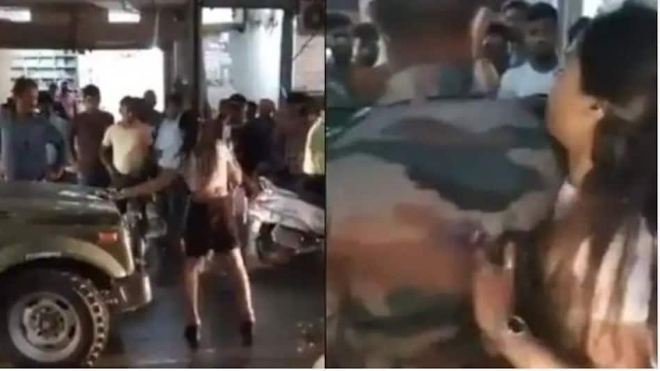 नशे में धुत लड़की ने सेना के जवान को मारा धक्का नशे में धुत लड़की ने सेना के जवान को मारा धक्का