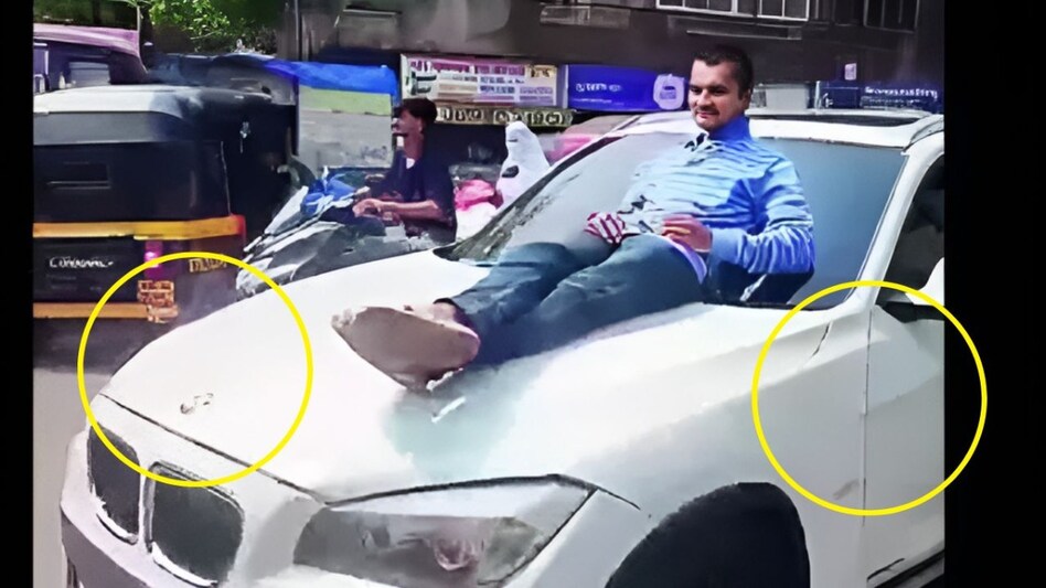 Viral Video: BMW के बोनट पर लेट कर किया स्टंट, मुंबई पुलिस ने दर्ज किया मुकदमा Viral Video: BMW के बोनट पर लेट कर किया स्टंट, मुंबई पुलिस ने दर्ज किया मुकदमा