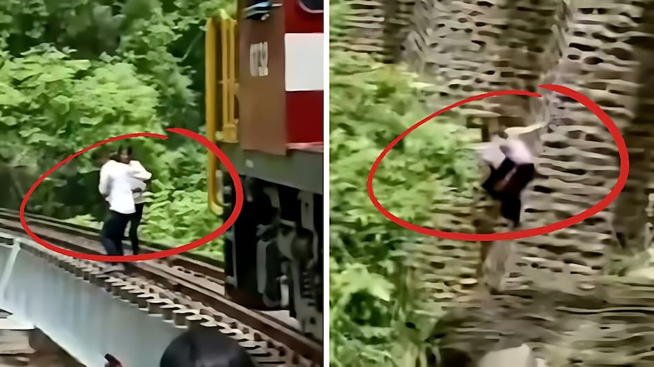 VIDEO: रेलवे ट्रैक पर सेल्फी ले रहे थे पति-पत्नी, तभी पास आती ट्रेन को देख खाई में लगा दी छलांग और फिर VIDEO: रेलवे ट्रैक पर सेल्फी ले रहे थे पति-पत्नी, तभी पास आती ट्रेन को देख खाई में लगा दी छलांग और फिर