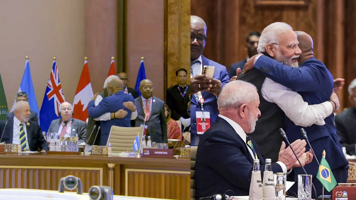 अजाली असौमानी से गले मिलते पीएम मोदी