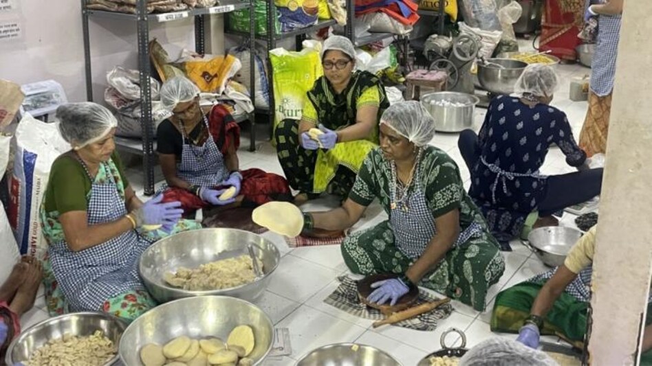Patil Kaki sells maharashtrian traditional snacks Patil Kaki sells maharashtrian traditional snacks