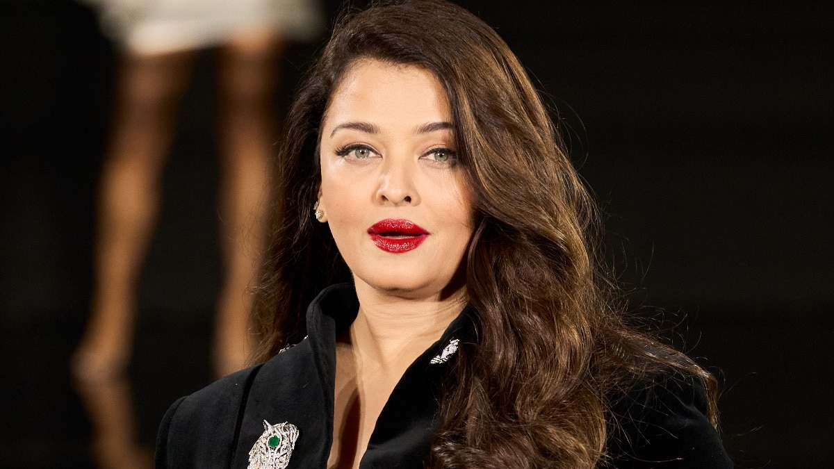 Aishwarya Rai is all suited up in velvet for the runway at the Paris Fashion Week
